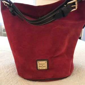 Dooney & Bourke red suede bucket shoulder bag.